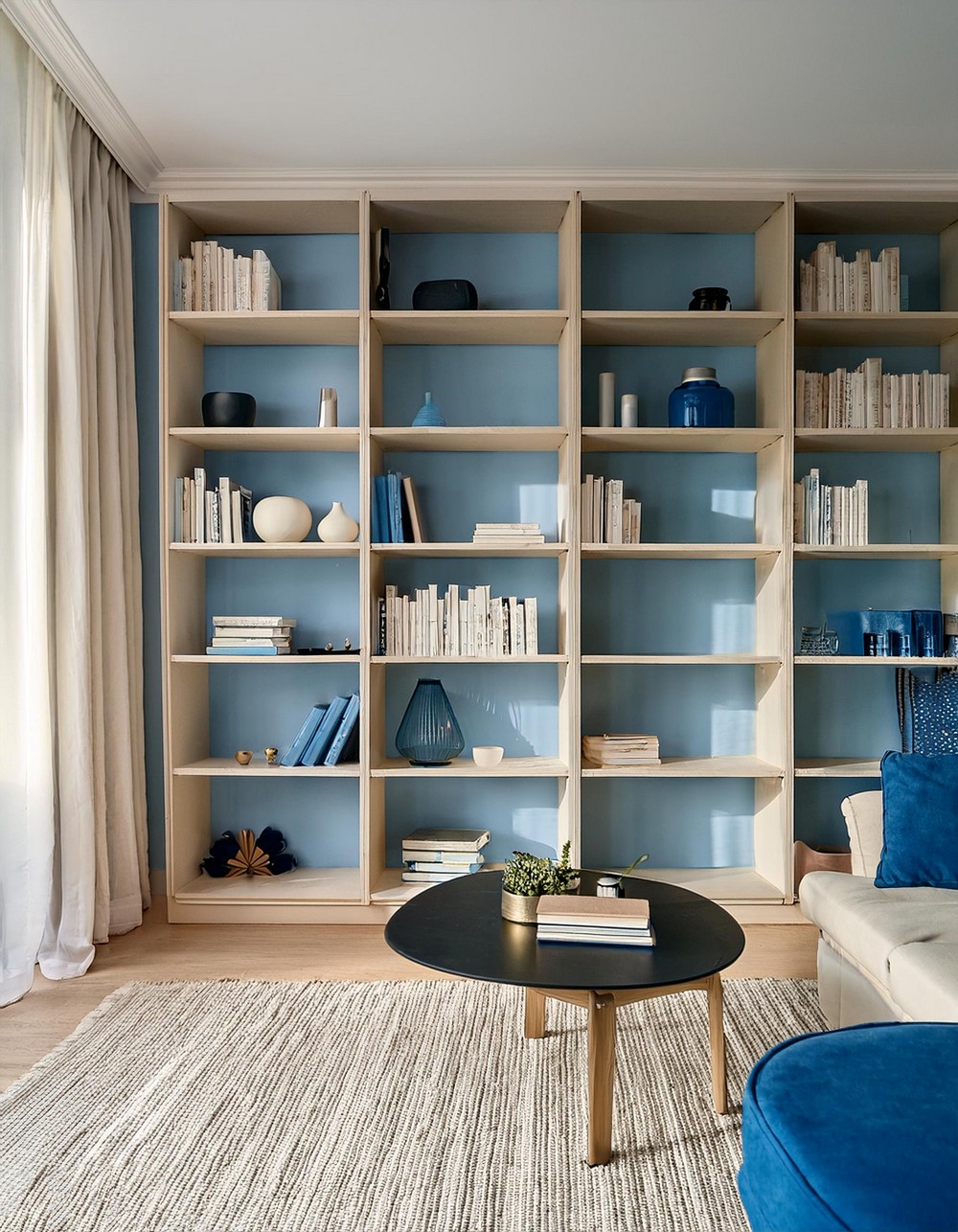 Cream Bookshelves with Blue Backs