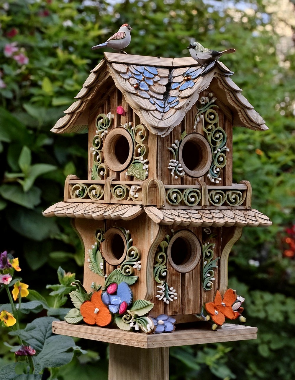 Intricate Carved Birdhouse with Floral Motifs