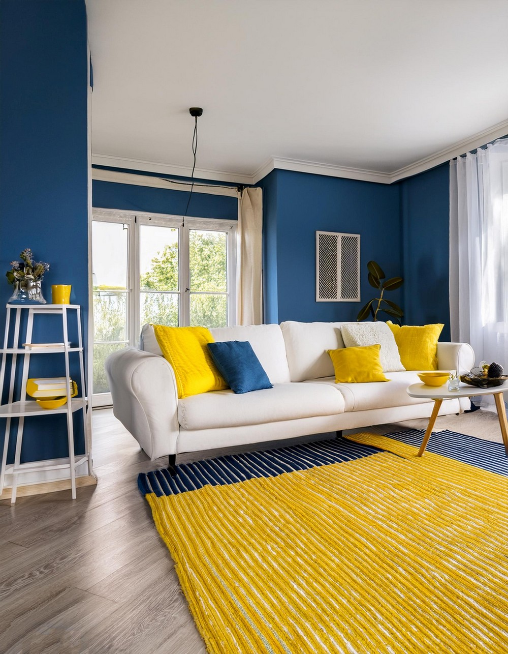 Yellow and Blue Striped Rug with White Furniture